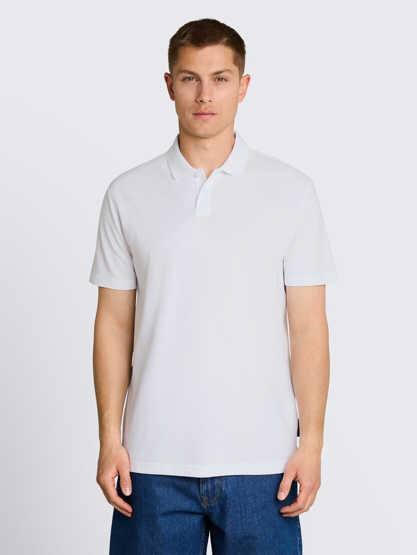 Strukturirana polo majica - Bela_6737093